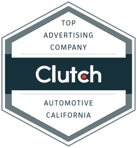 Hexagonal badge reading “Top Advertising Company Clutch Automotive California” with a dark central band and gray border—an accolade highlighting IOI Solutions as a leading Automotive Marketing Agency.