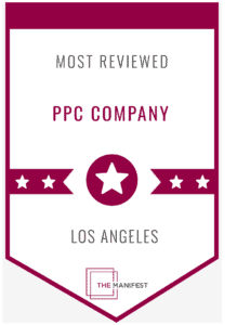 Award badge with a star, reading “Most Reviewed PPC Company Los Angeles,” and “The Manifest” logo at the bottom—highlighting IOI Solutions as an Automotive Marketing Agency leader.